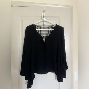 Phanuel Bohemian black blouse with beautiful woven pattern on the back